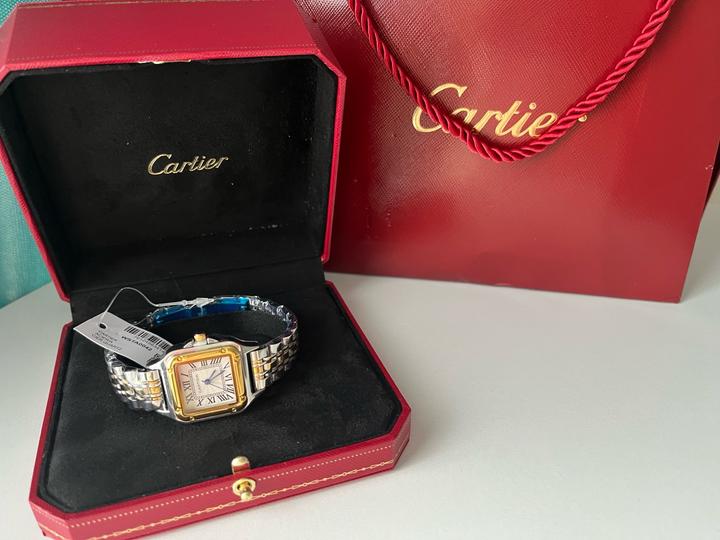 Часы от бренда Cartier