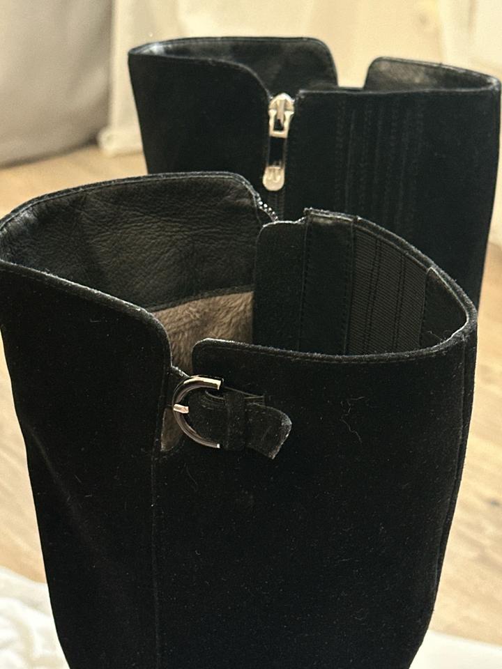 Зимние сапоги на каблуках