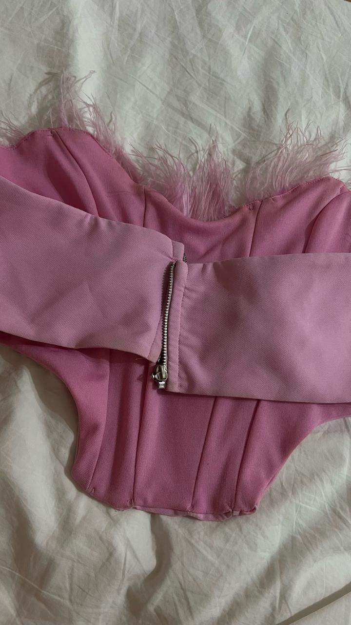 Новый корсет розовый с перьями