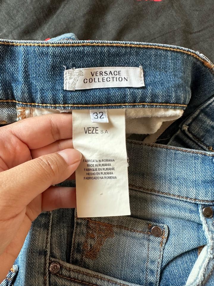 Джинсы Versace