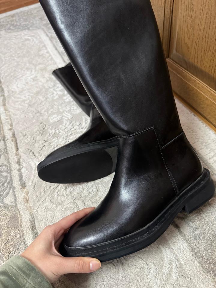 Новые женские сапоги