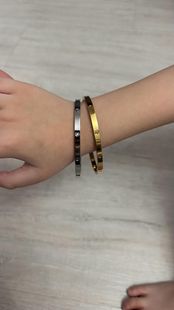 Браслет Cartier из титана золотистый