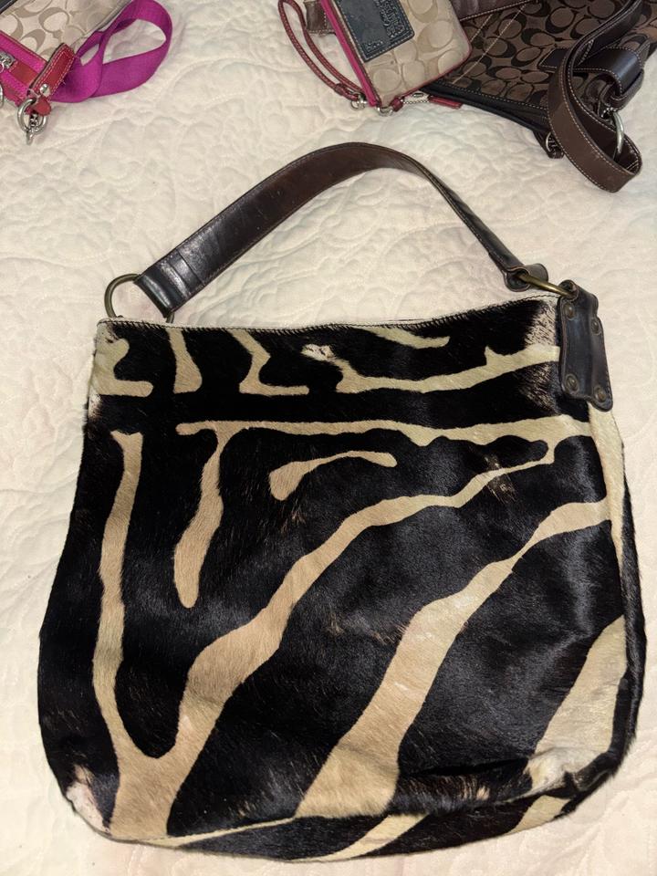 сумка итальянского бренда Maurizio Taiuti
