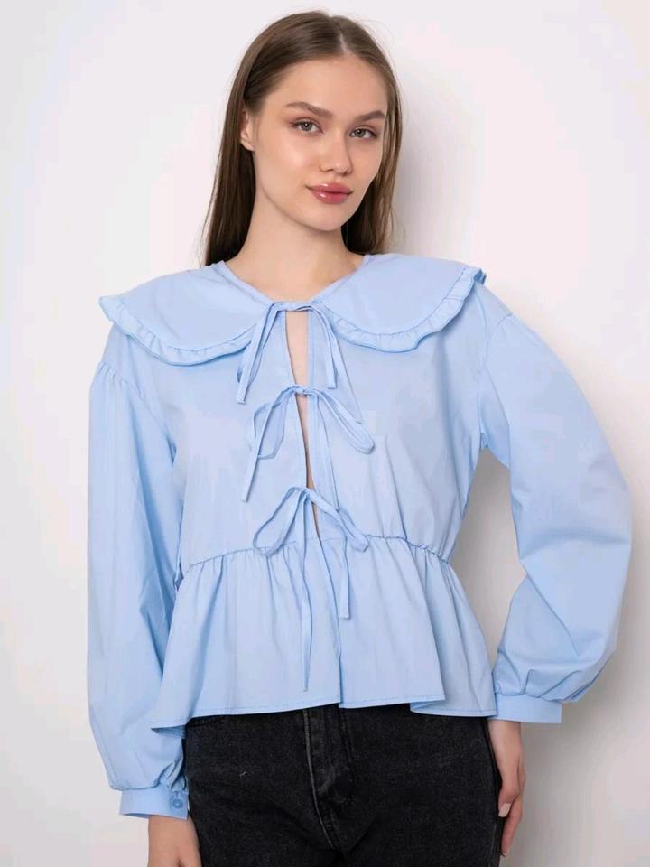 Блузка с бантиками