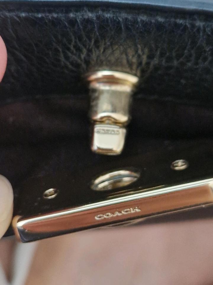 Чёрная сумочка от Coach