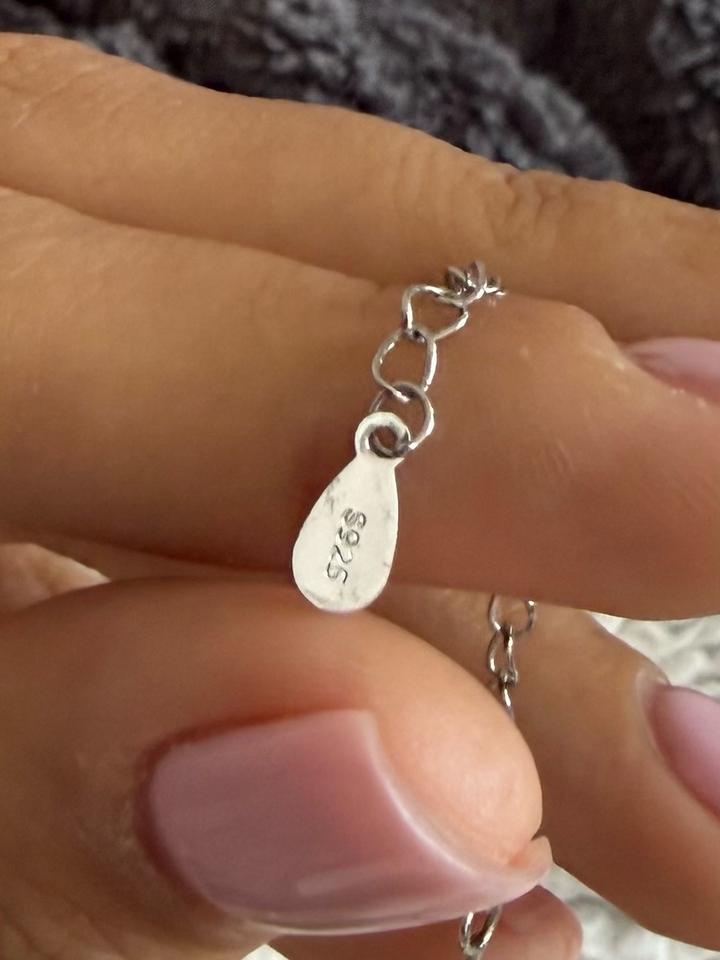 серебряная цепочка со звездочками