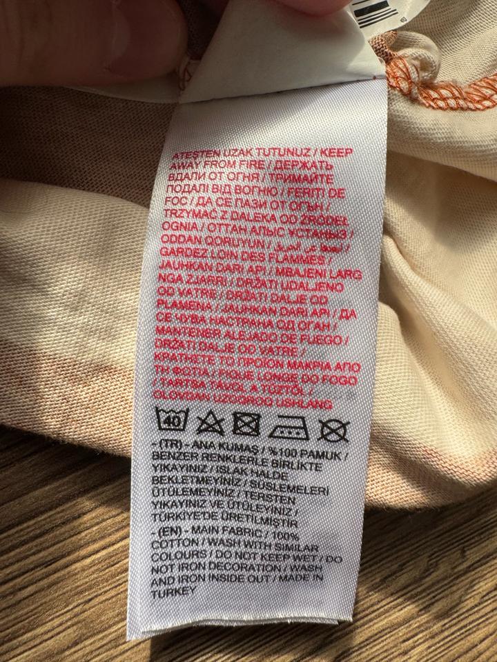 Оранжево бежевая кофточка осенняя
