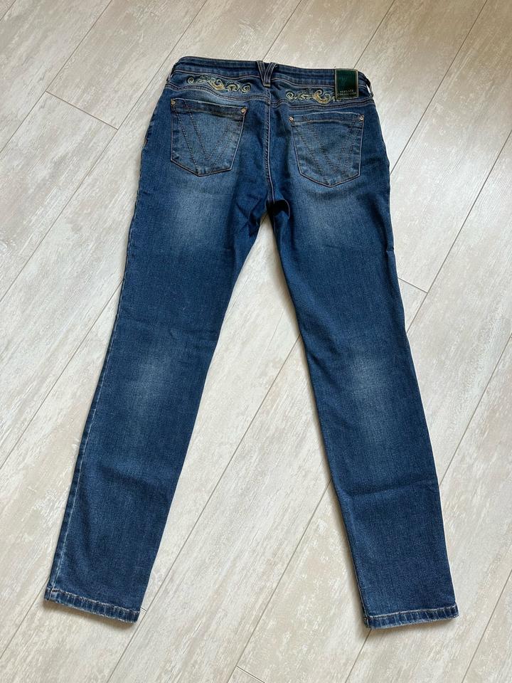 Джинсы Versace