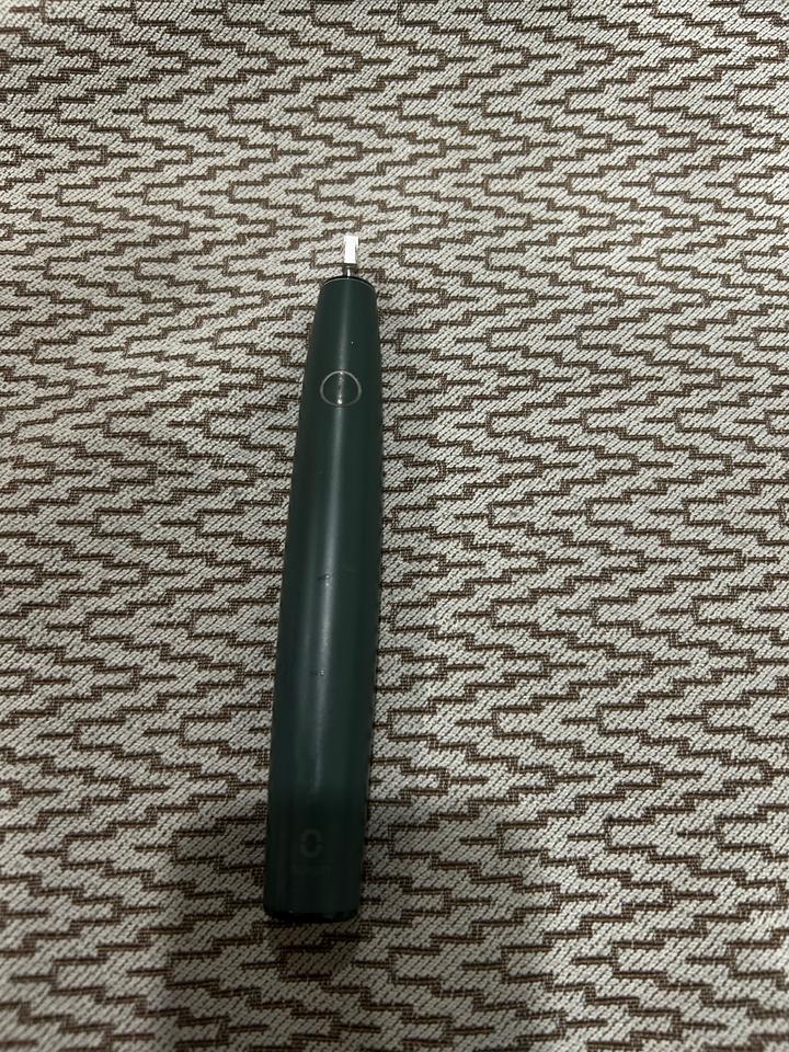 Электрическая зубная щетка