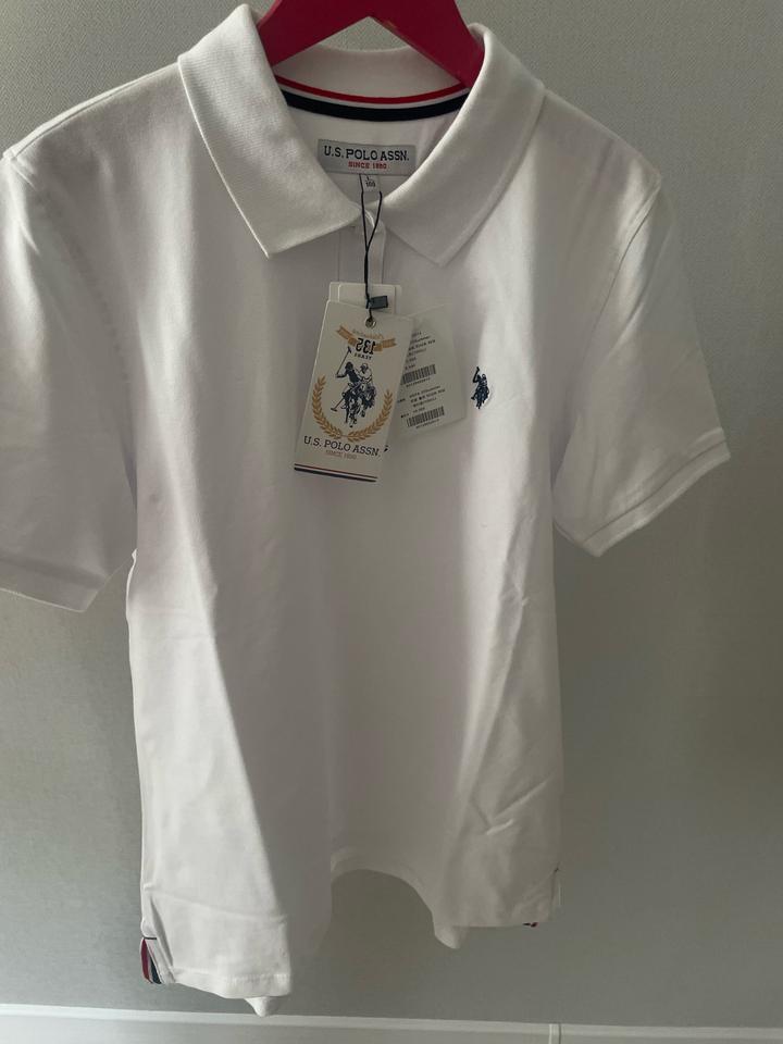 белая футболка-поло от американского бренда U.S. Polo Assn