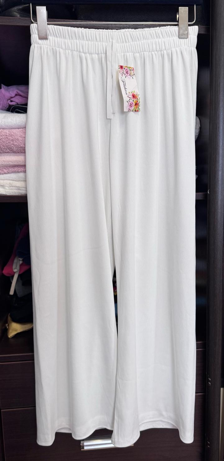 Белые летние брюки свободного кроя