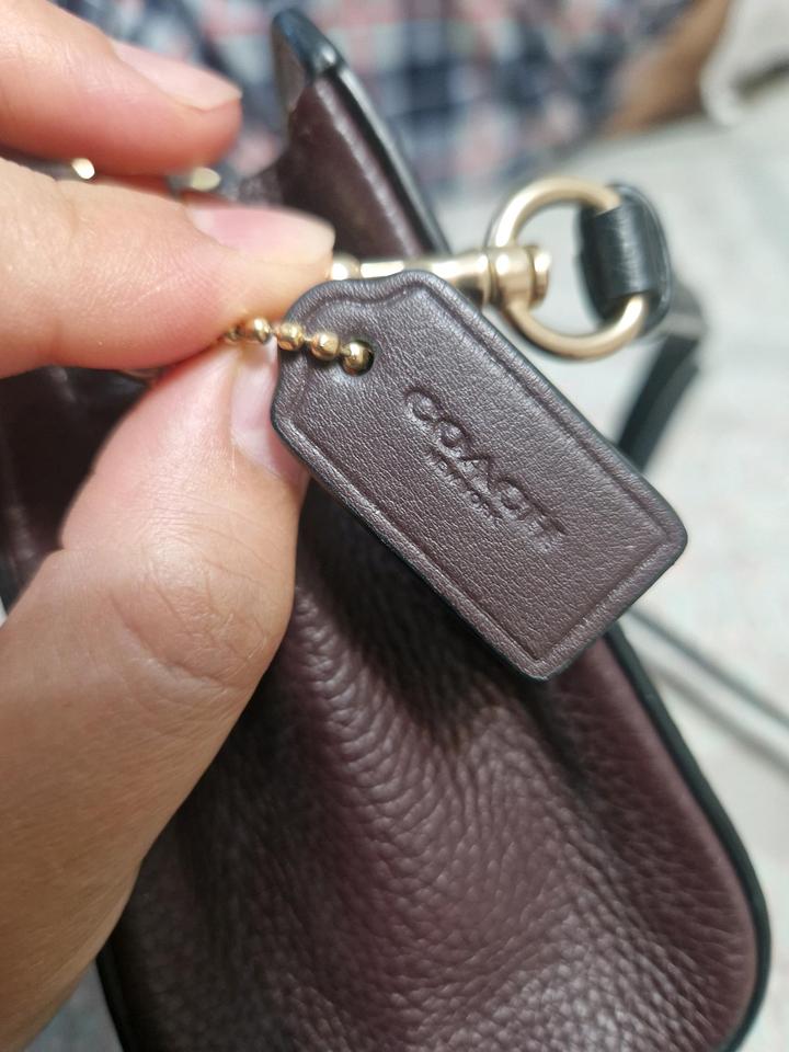 Чёрная сумочка от Coach