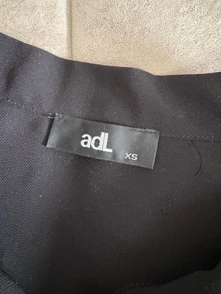 Черная блузка из adl