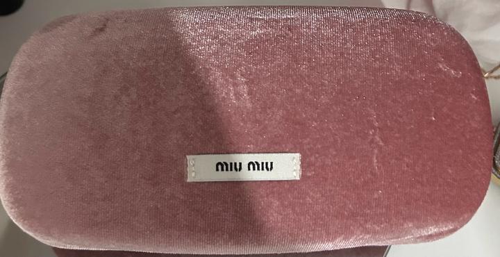 Женский очки от miu miu
