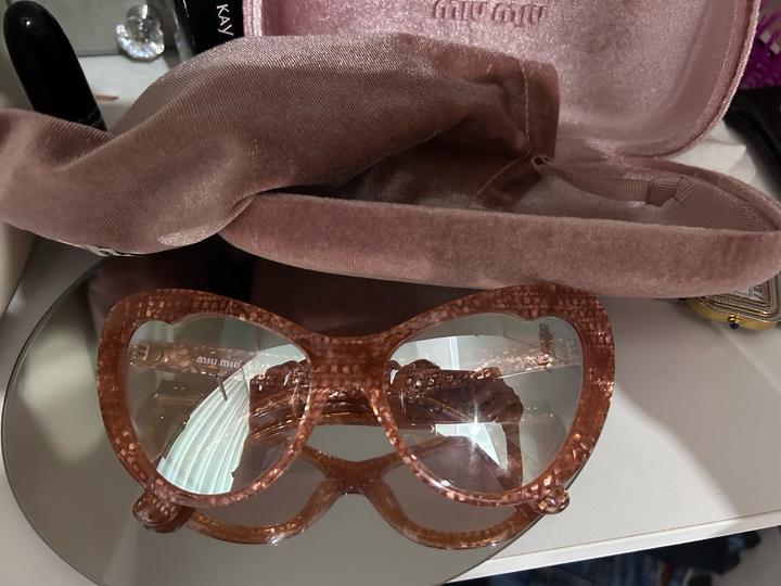 Женский очки от miu miu
