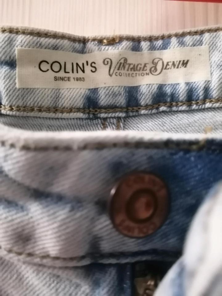 Джинсы Colins