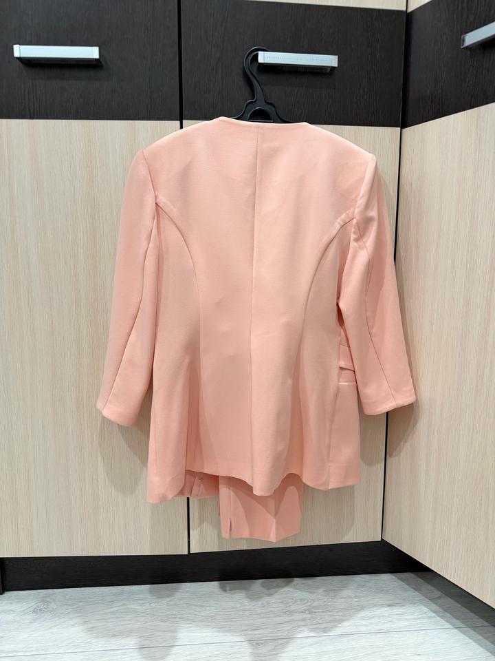 Костюм новый