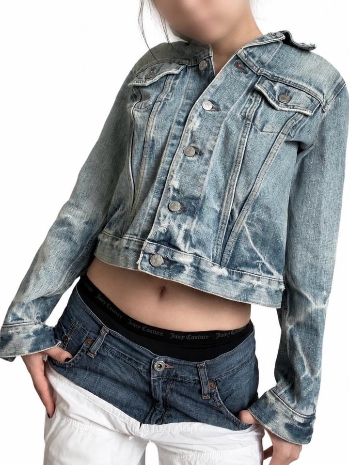 Distressed denim jacket