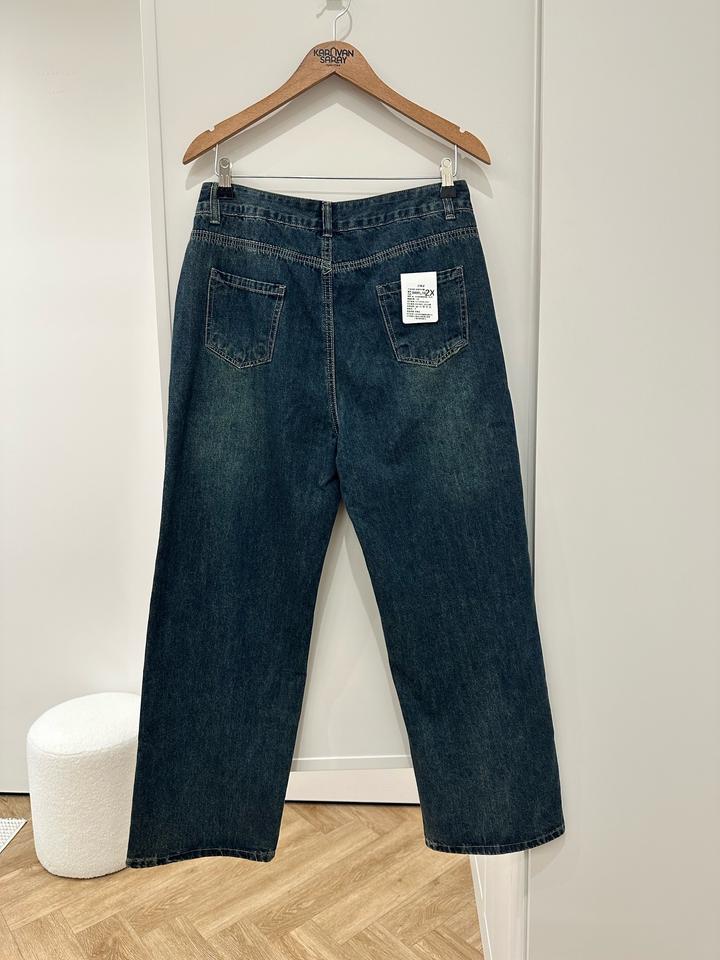 Джинсы новые