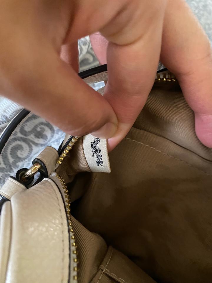Белая сумка coach