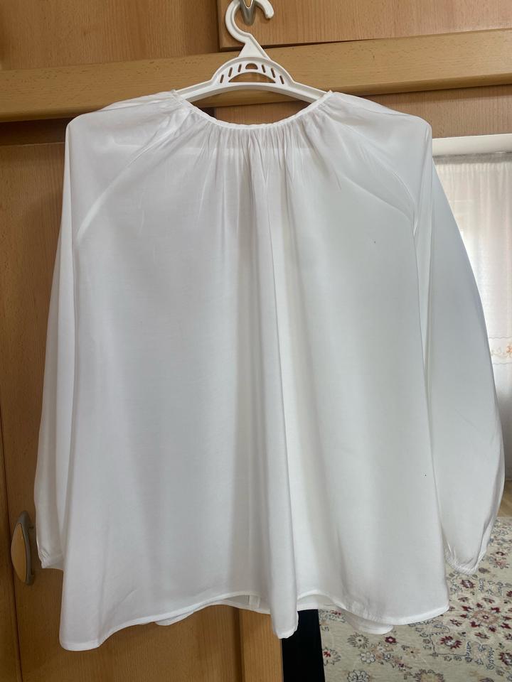 Белая блузка
