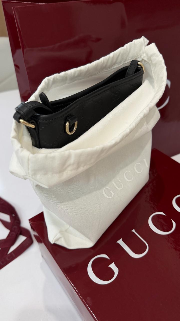 Сумка Gucci GG Emblem nano bucket bag