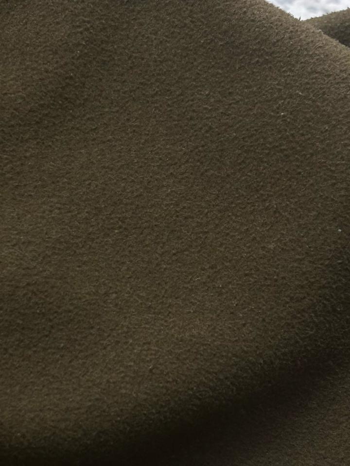 Темно зеленое пальто