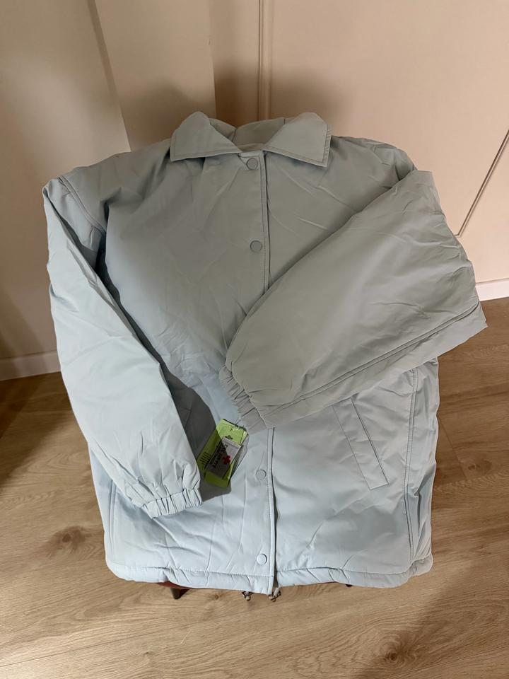 Куртка голубая