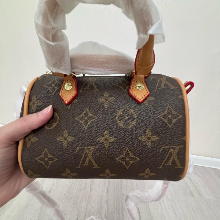 Маленькая коричневая сумка-бочонок Louis Vuitton