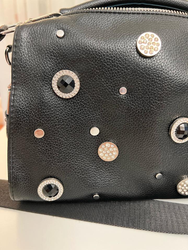 Эффектная сумка из натуральной кожи