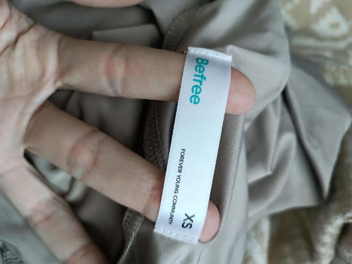 Блузка без рукавов с драпировками