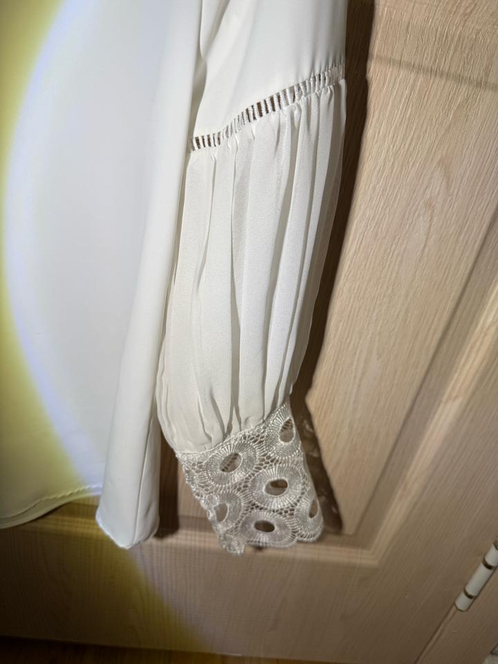 Белая блузка