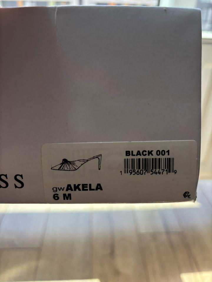 Черные кожаные мюли Guess