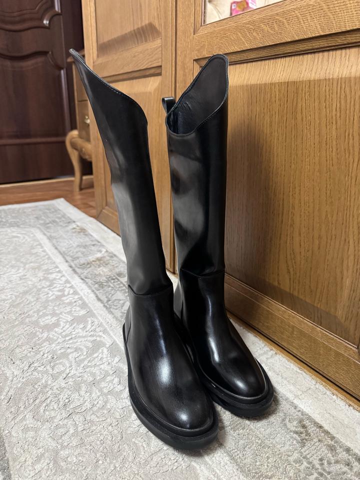 Новые женские сапоги
