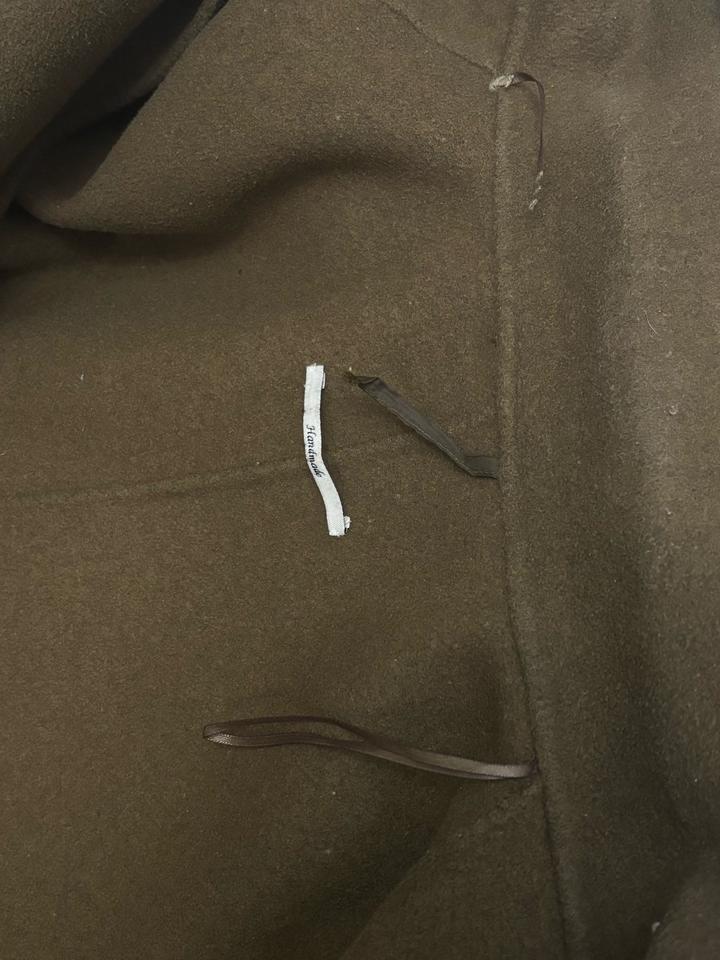 Темно зеленое пальто