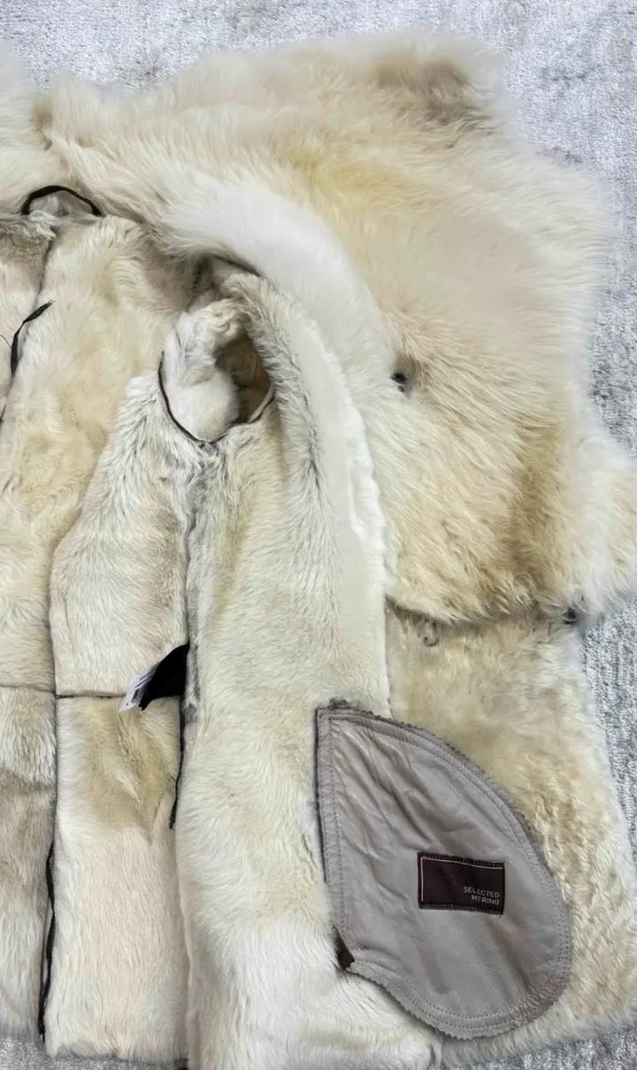 Женская дубленка рыжая