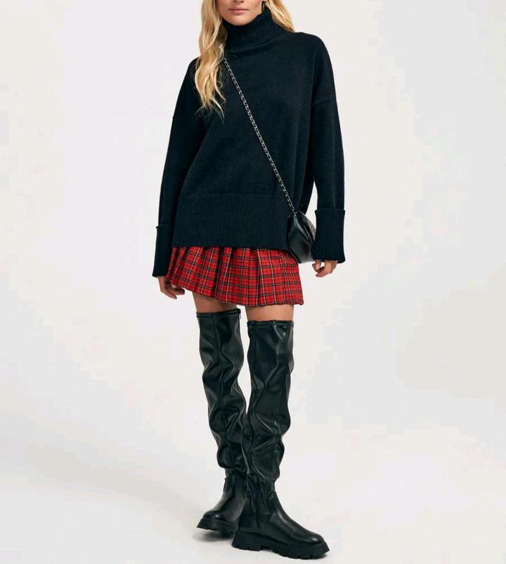 Удлиненный вязаный свитер