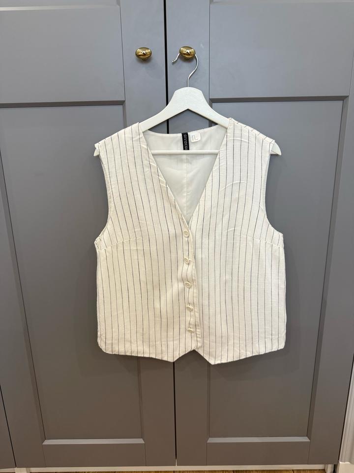 Продам льняную жилетку H&M