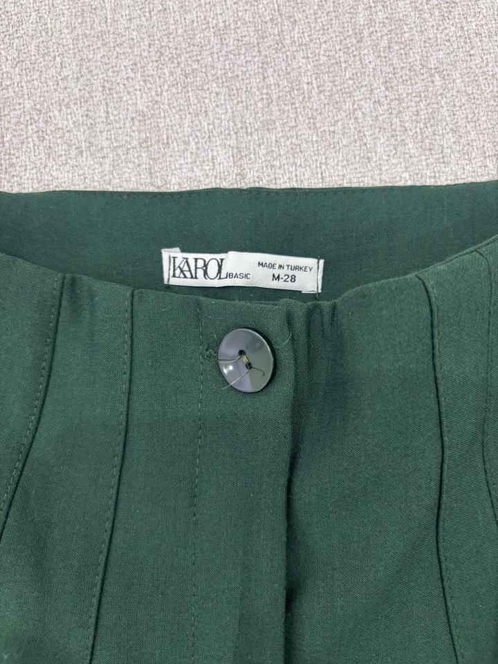 Продам брюки новые