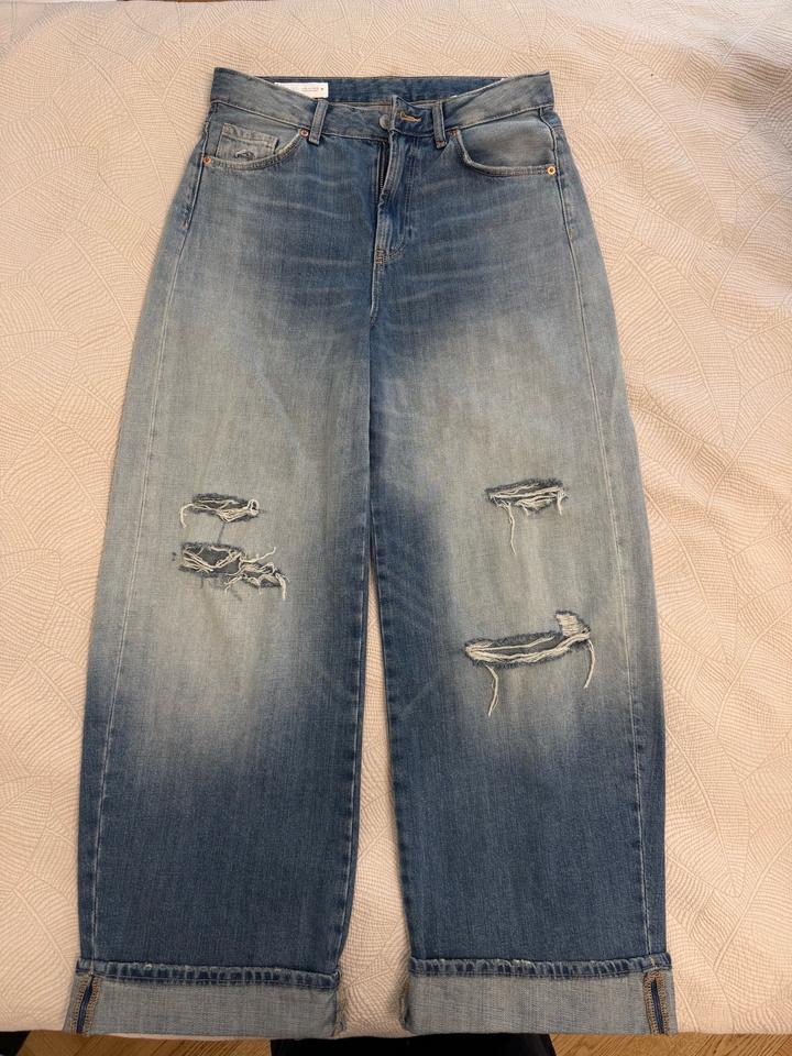 Рваные джинсы Zara