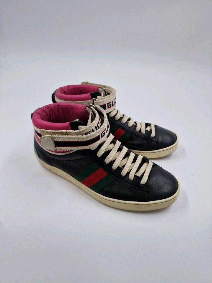 Чёрные кроссовки Gucci