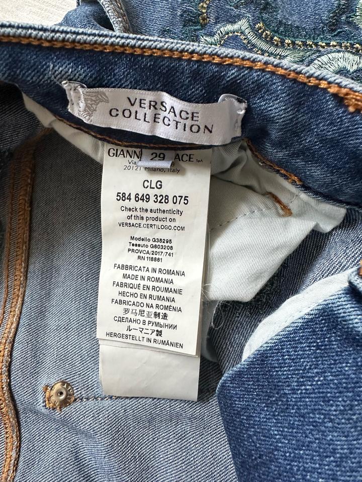 Джинсы Versace