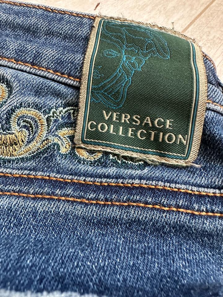 Джинсы Versace
