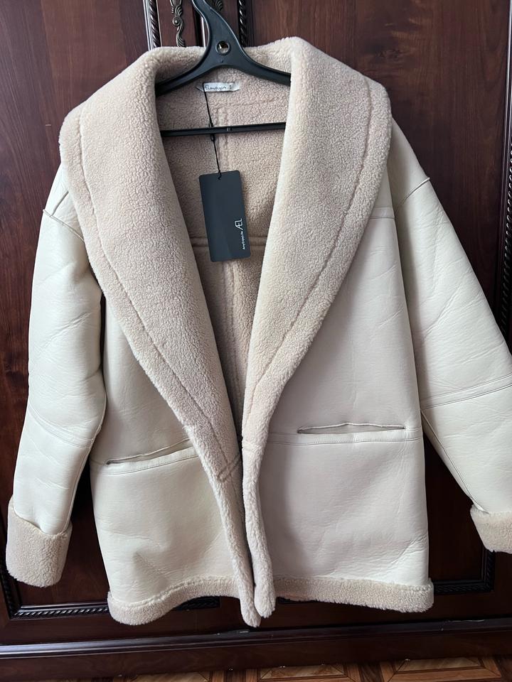 Дубленка новая