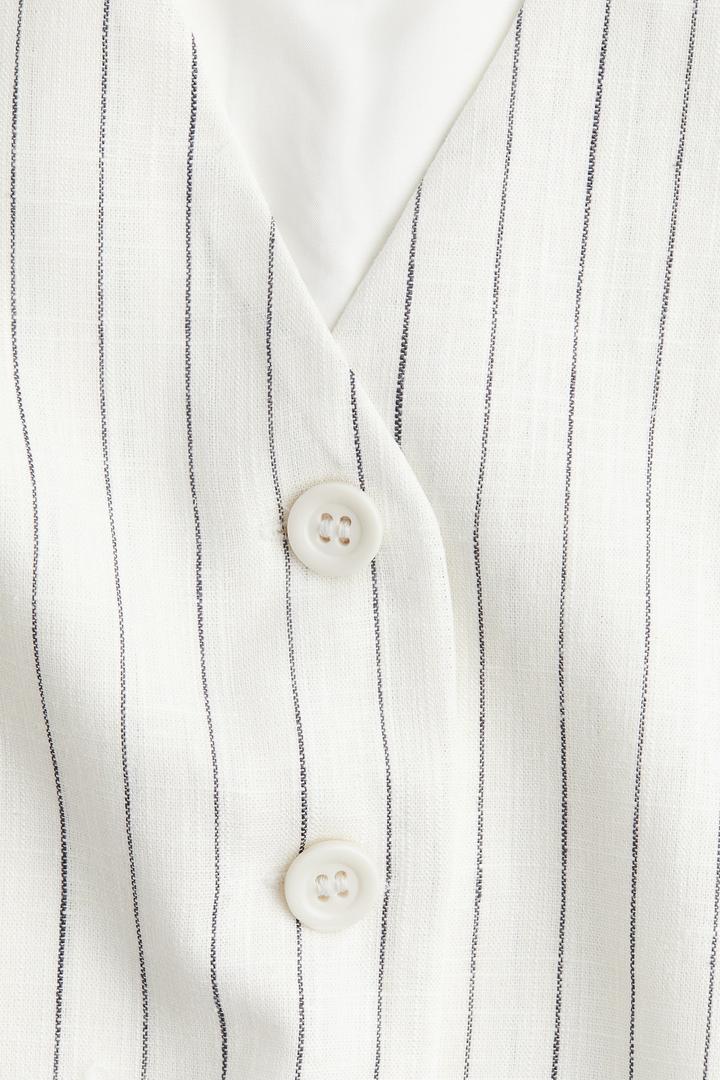 Продам льняную жилетку H&M