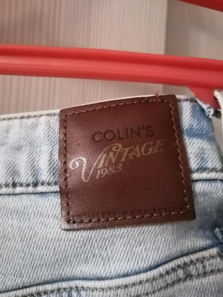 Джинсы Colins