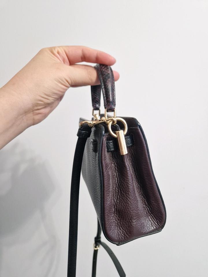 Чёрная сумочка от Coach