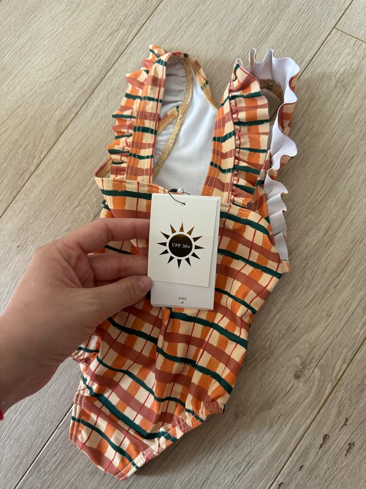 Купальник на девочку 6 мес новый