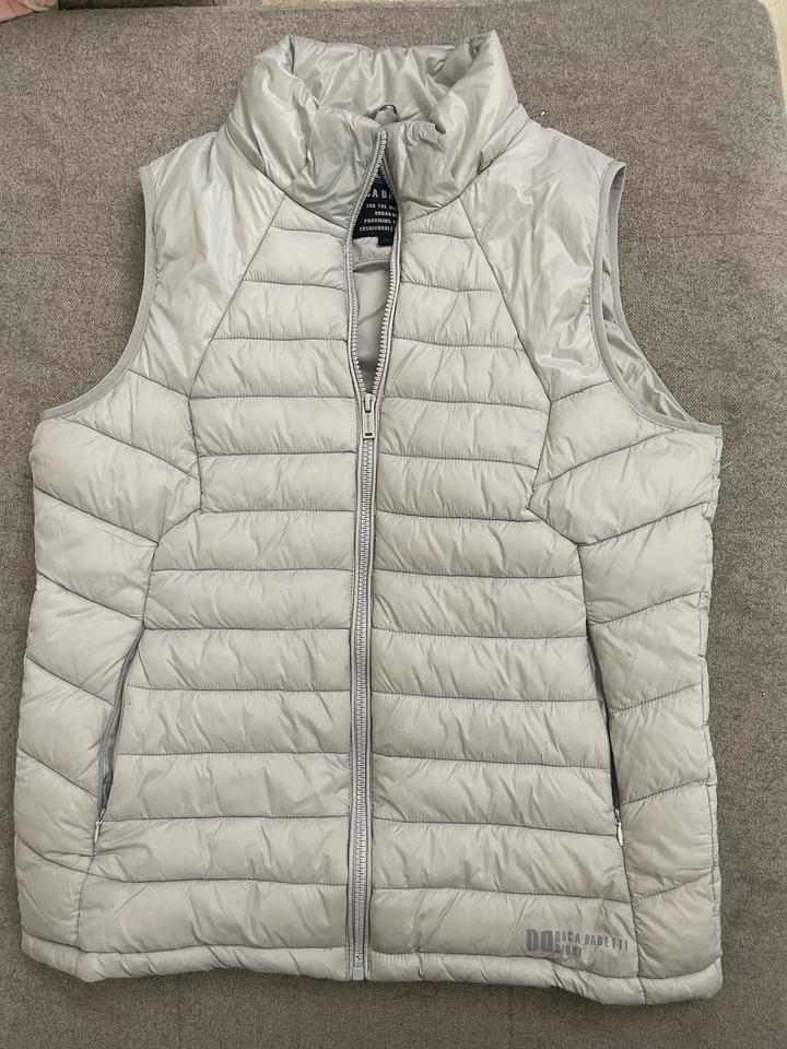 Безрукавка от бренда DUKA DARETTI