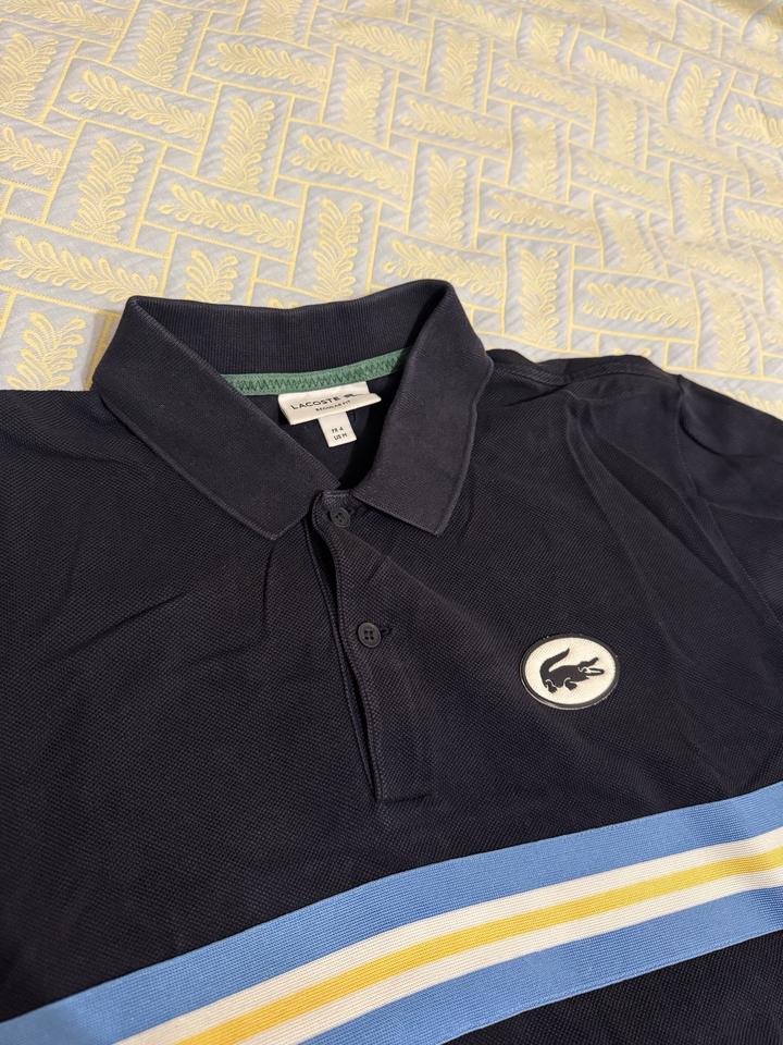 Синее поло Lacoste